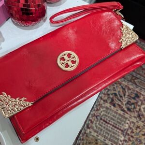 Elegant Red Clutch with Gold Accents.